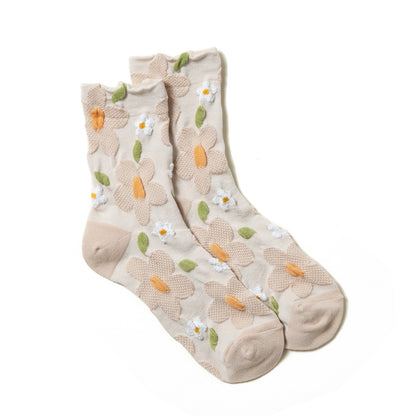 Luxurious ivory women's socks featuring textured floral patterns