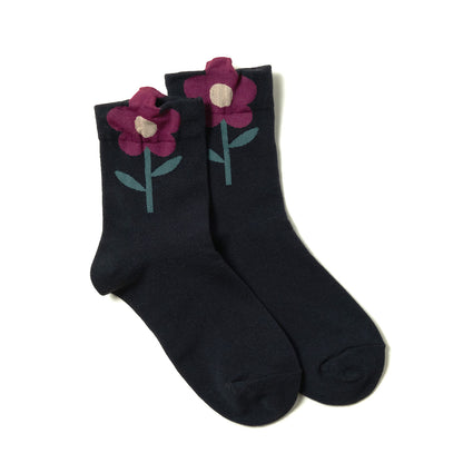 Playful black women's ankle socks with colorful red flower