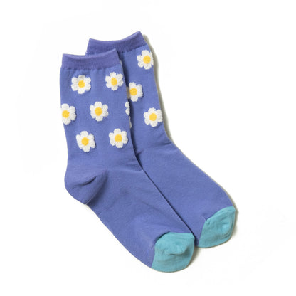 luxurious woman's purple ankle sock with white floral dots pattern and blue toe box