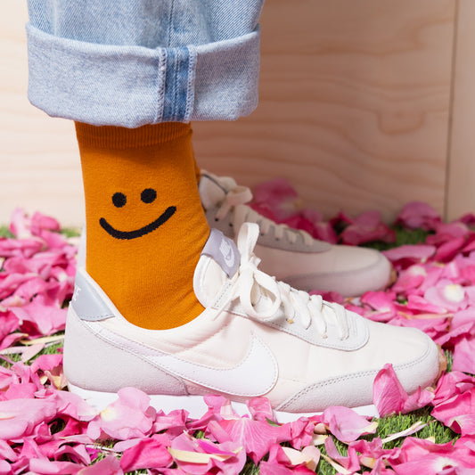 yellow smiley face ankle korean women's socks on body with nike shoes