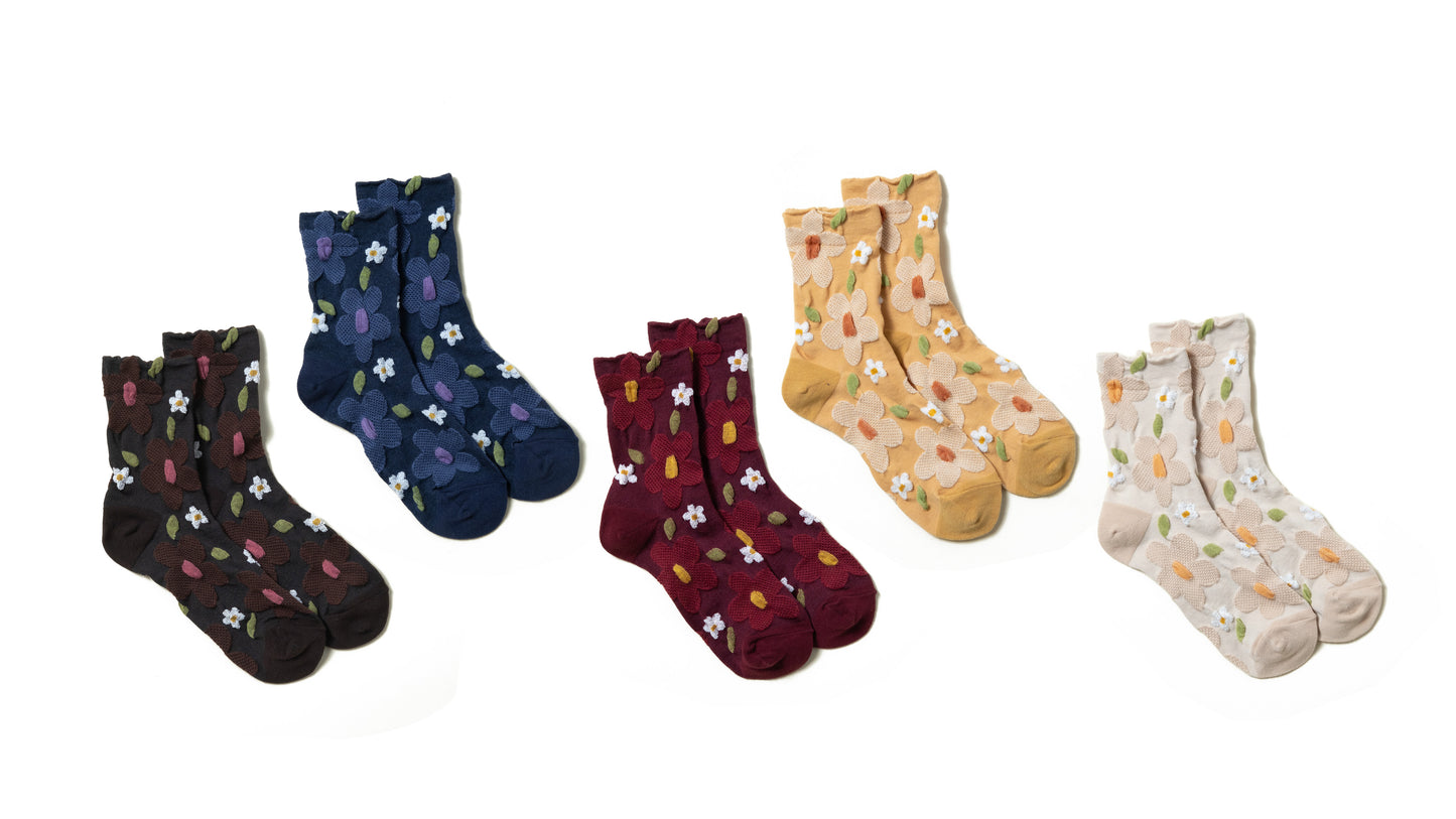 a line up for Luxurious colorful women's socks featuring textured floral 